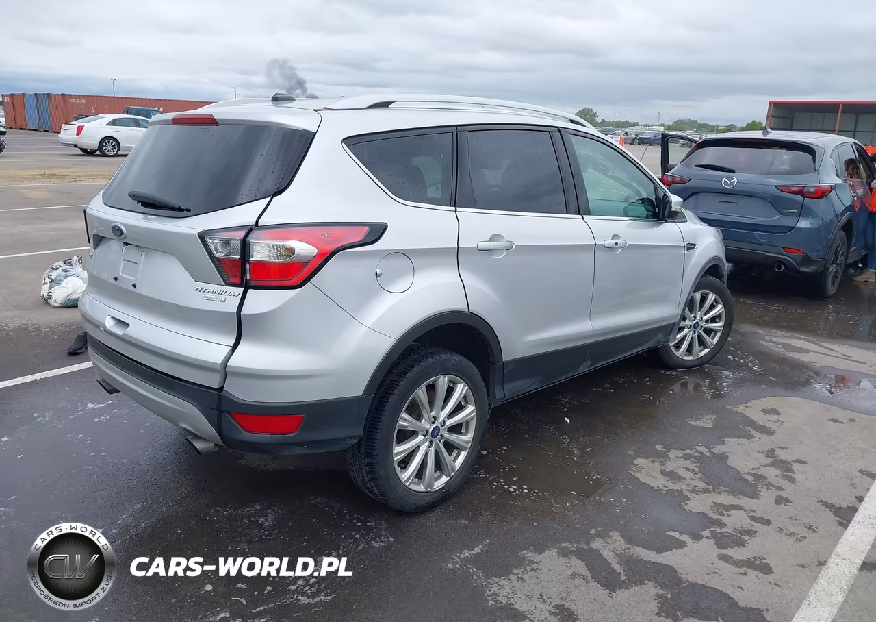 2017 Ford Escape Titanium VIN:1FMCU0J95HUE53075 - 4