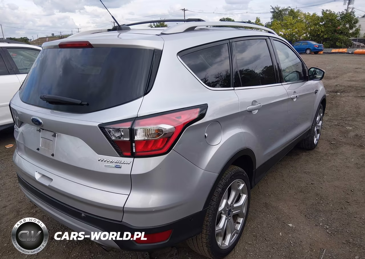 2017 Ford Escape Titanium VIN:1FMCU9J96HUD99953 - 4