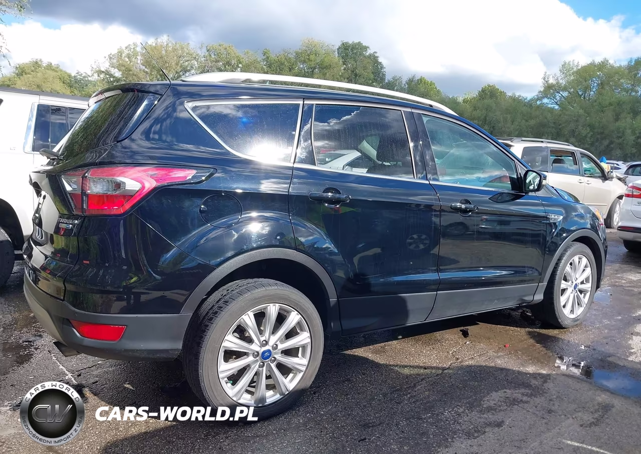 2017 Ford Escape Titanium VIN:1FMCU9JD6HUD21337 - 14