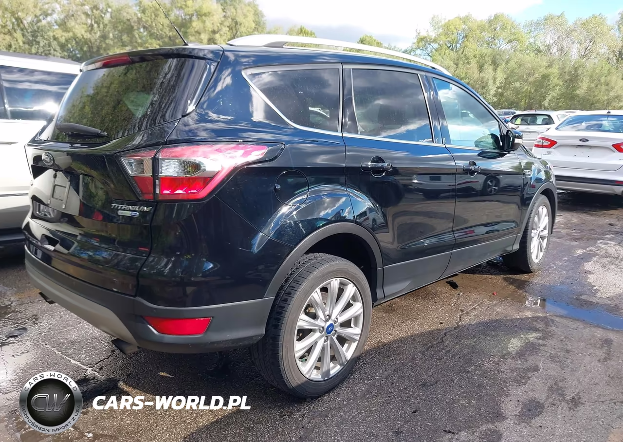 2017 Ford Escape Titanium VIN:1FMCU9JD6HUD21337 - 4