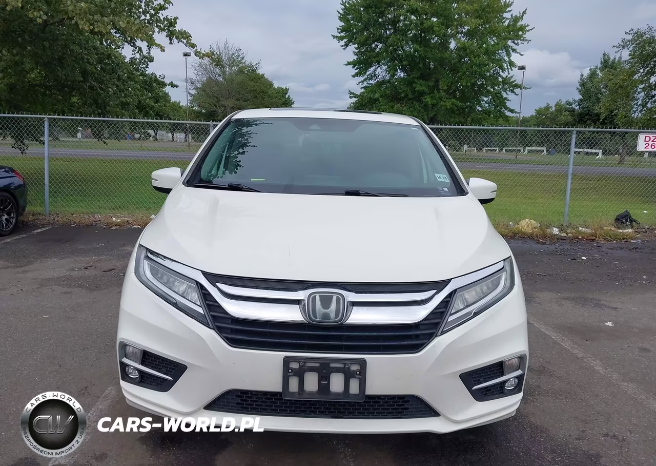 2019 Honda Odyssey Touring VIN:5FNRL6H81KB030611 - 12