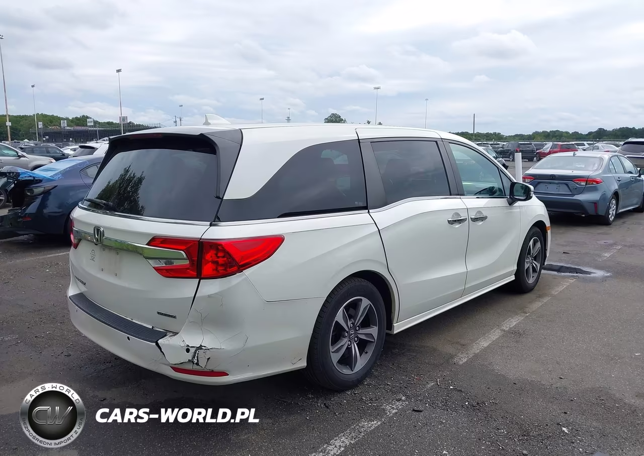 2019 Honda Odyssey Touring VIN:5FNRL6H81KB030611 - 4