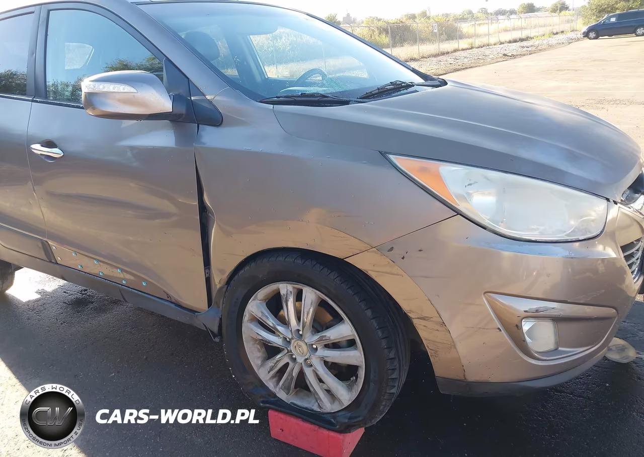 2012 Hyundai Tucson Limited VIN:KM8JUCAC1CU355335 - 6