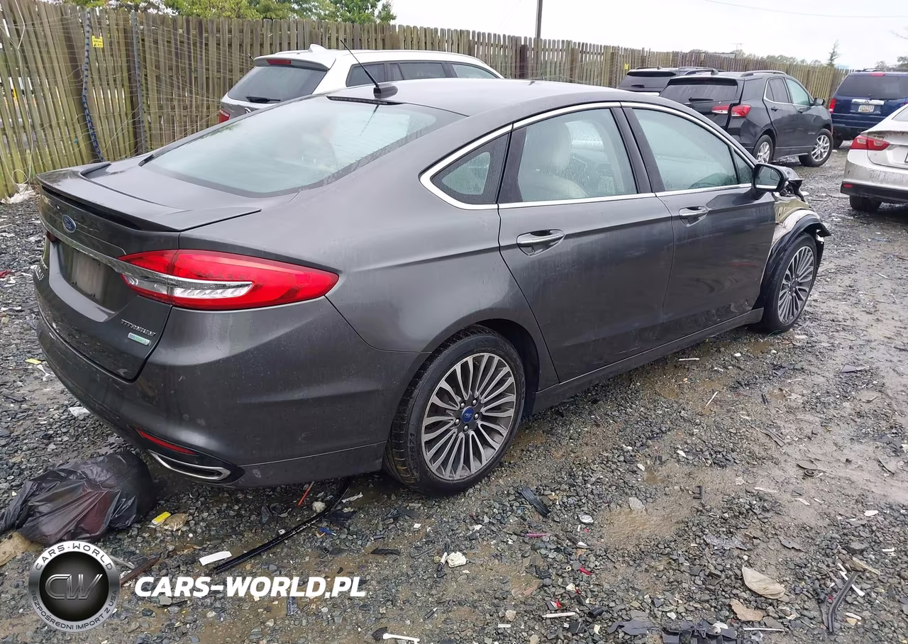 2017 Ford Fusion Platinum-Titanium VIN:3FA6P0K92HR116139 - 4