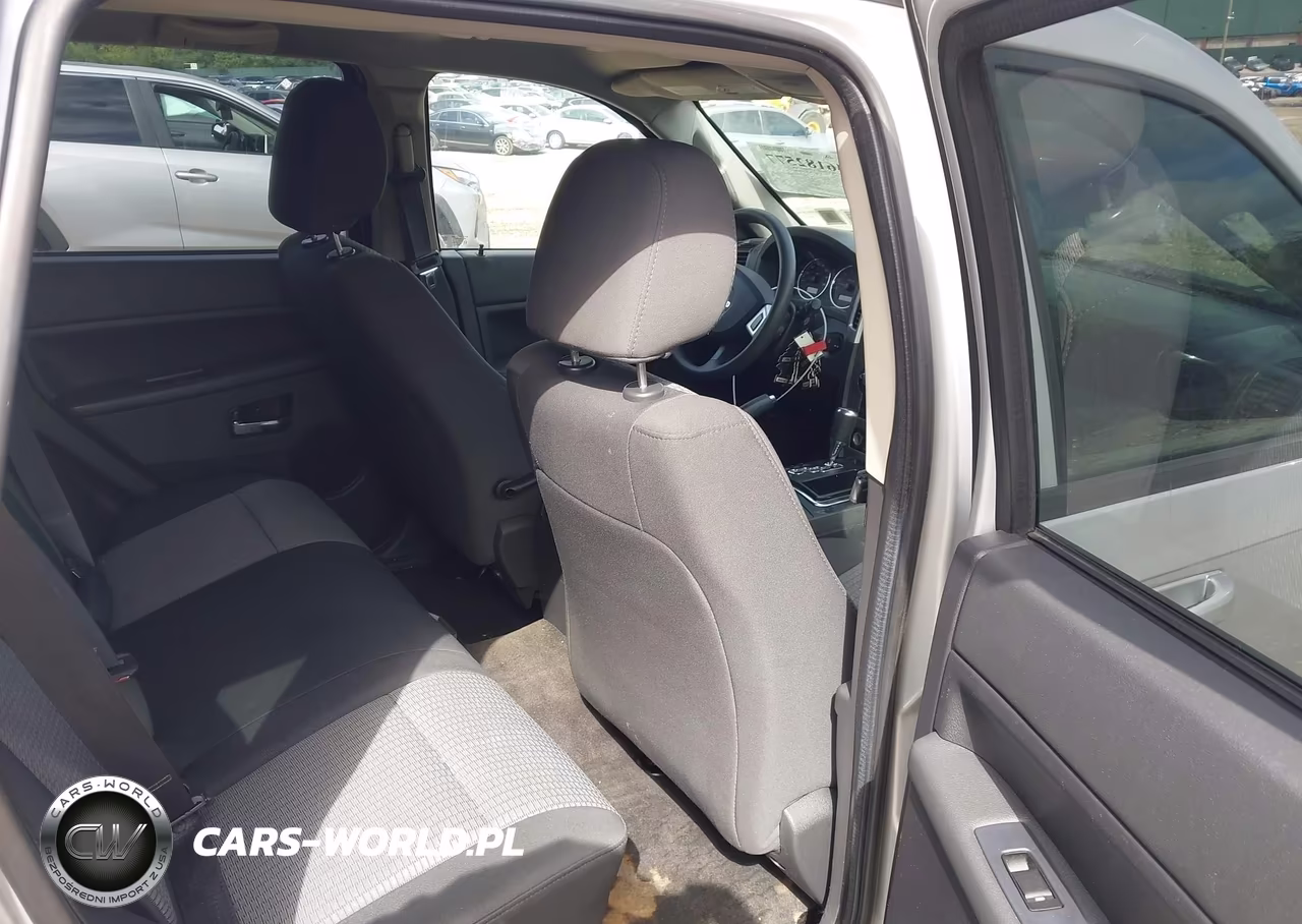2009 Jeep Grand Cherokee Laredo VIN:1J8GR48KX9C519742 - 8