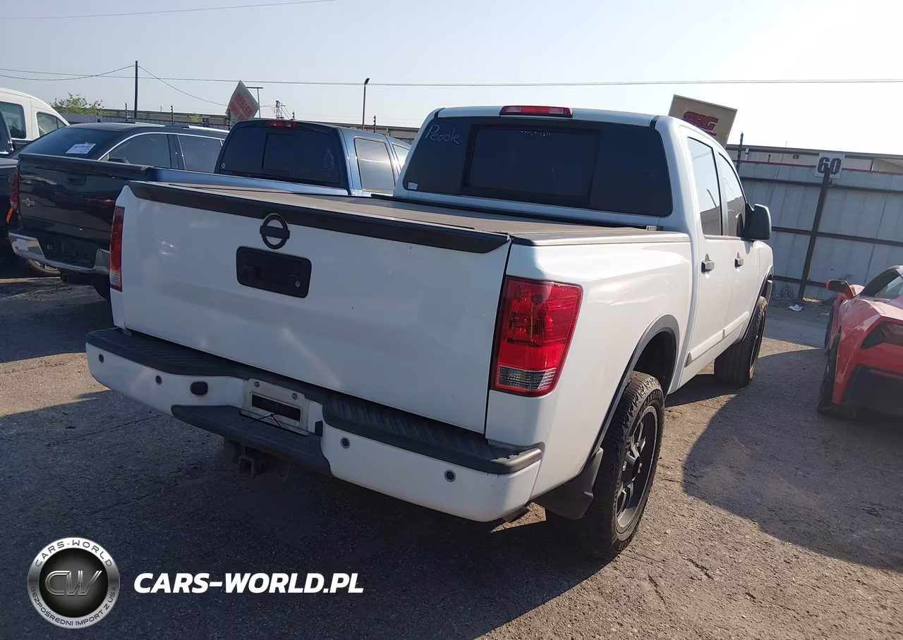 2013 Nissan Titan Pro-4X VIN:1N6BA0EC7DN306319 - 4