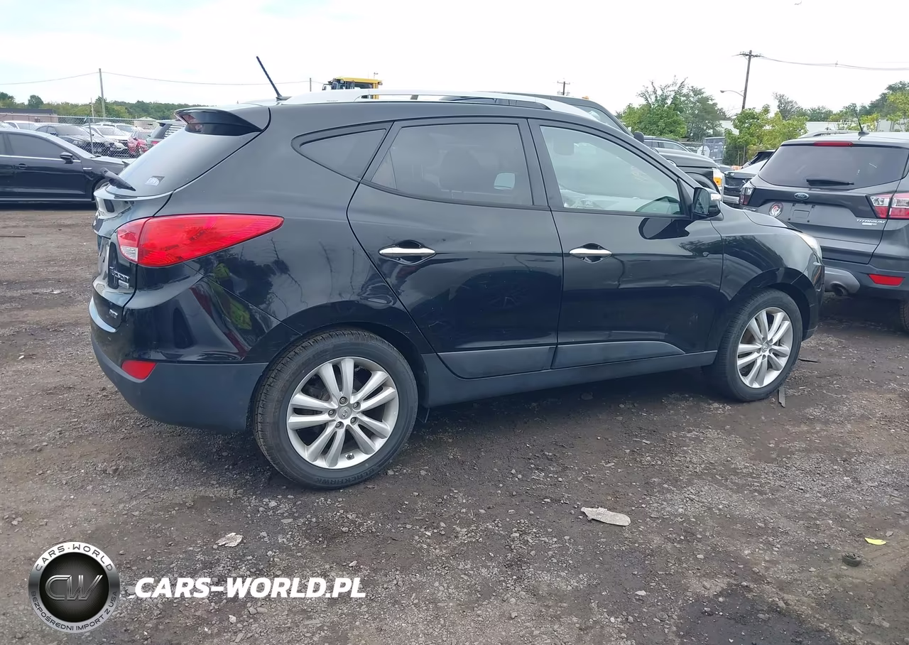 2012 Hyundai Tucson Limited VIN:KM8JUCACXCU481841 - 4