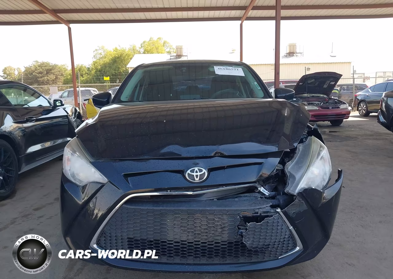 2019 Toyota Yaris L VIN:3MYDLBYVXKY521435 - 12