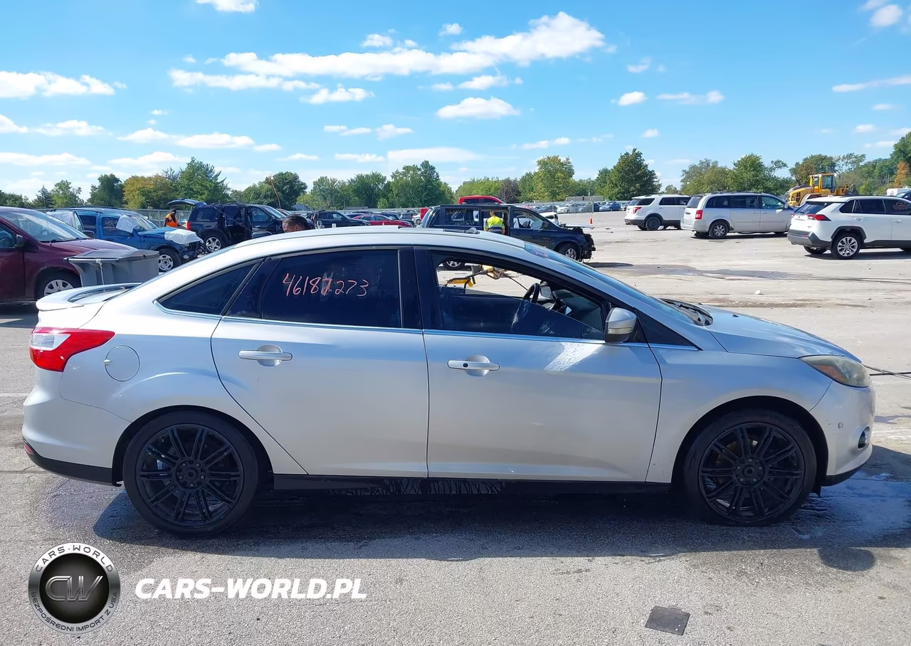2014 Ford Focus Titanium VIN:1FADP3J25EL149045 - 13