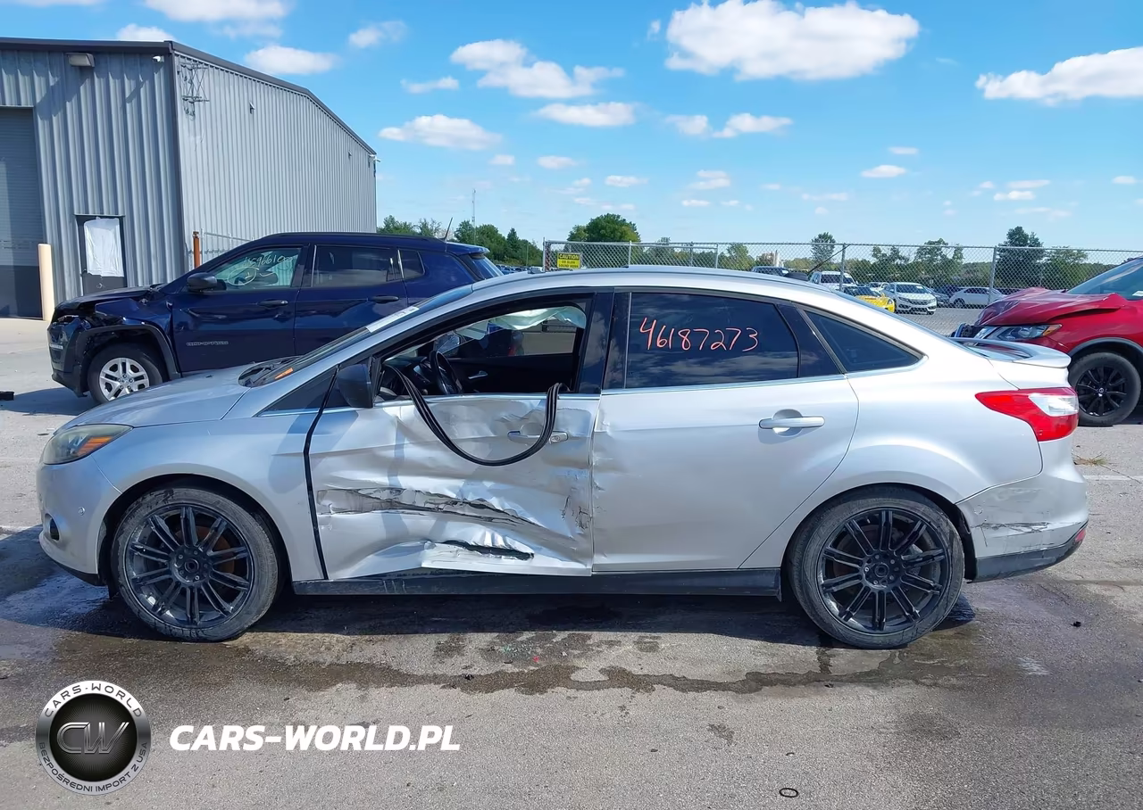2014 Ford Focus Titanium VIN:1FADP3J25EL149045 - 14