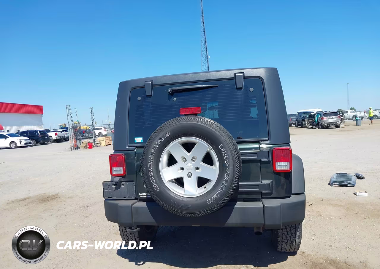 2011 Jeep Wrangler Sport VIN:1J4AA2D15BL636148 - 17