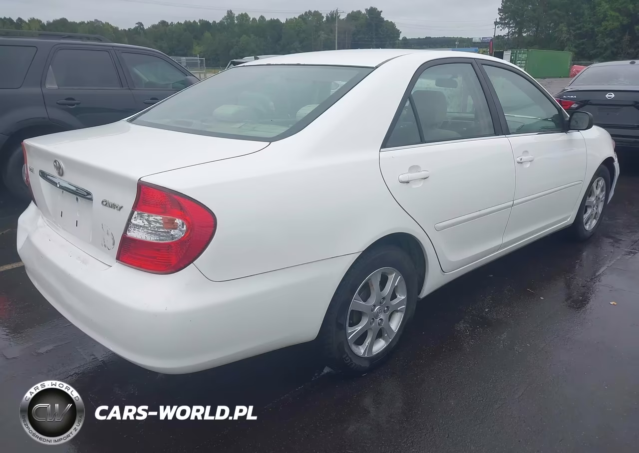 2004 Toyota Camry Le VIN:JTDBE32K640273394 - 4