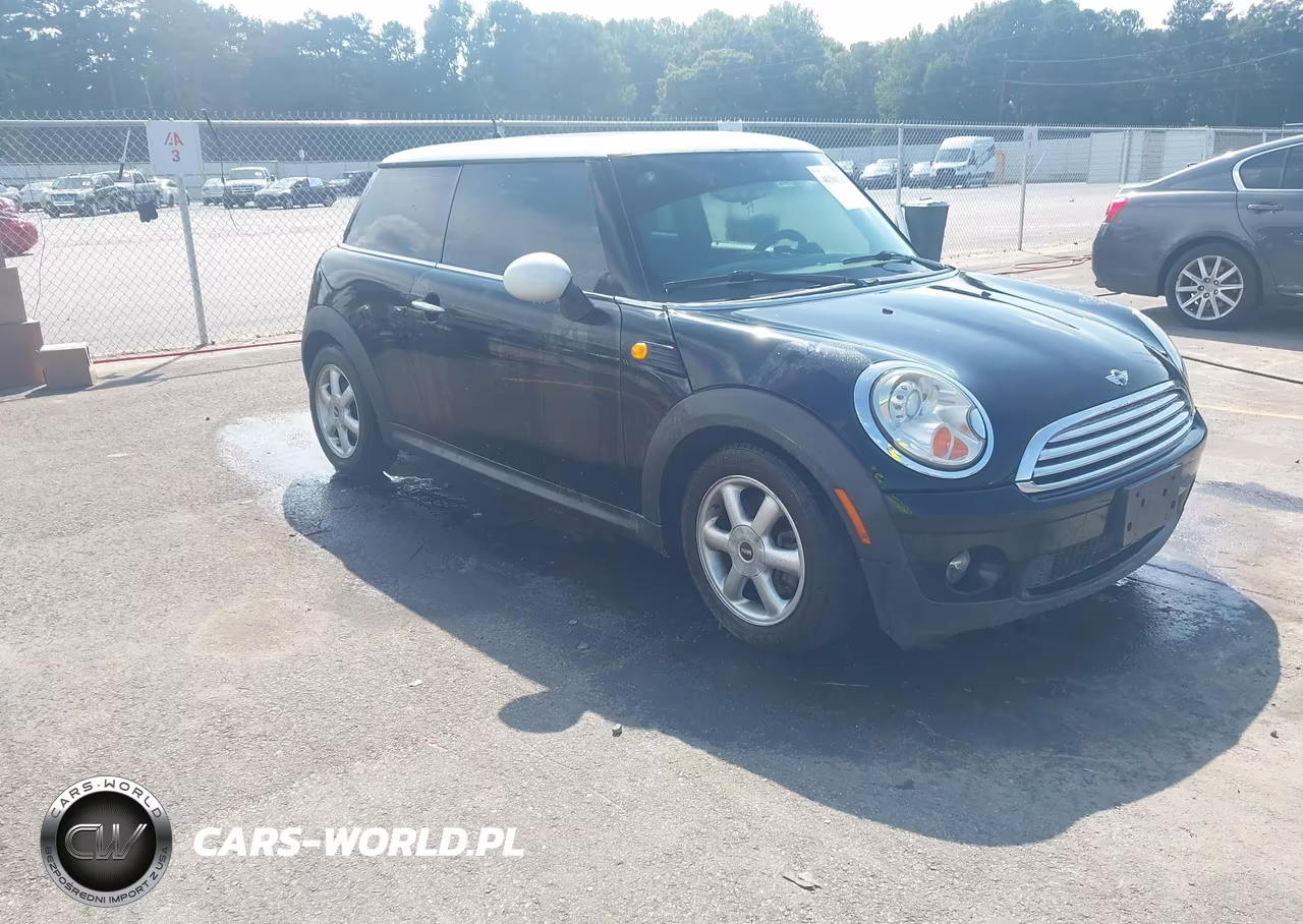 2009 Mini Cooper VIN:WMWMF33509TW76398 - 1