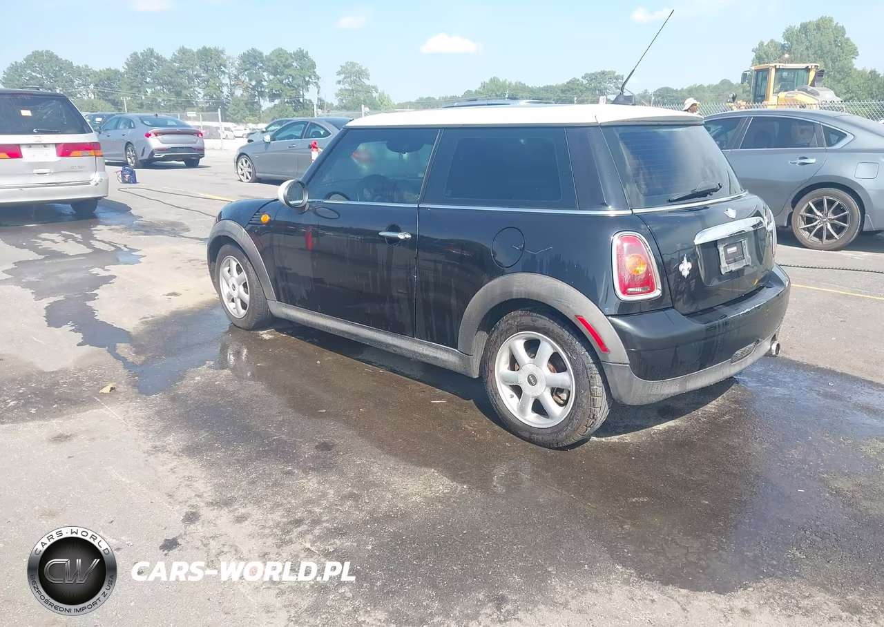 2009 Mini Cooper VIN:WMWMF33509TW76398 - 3
