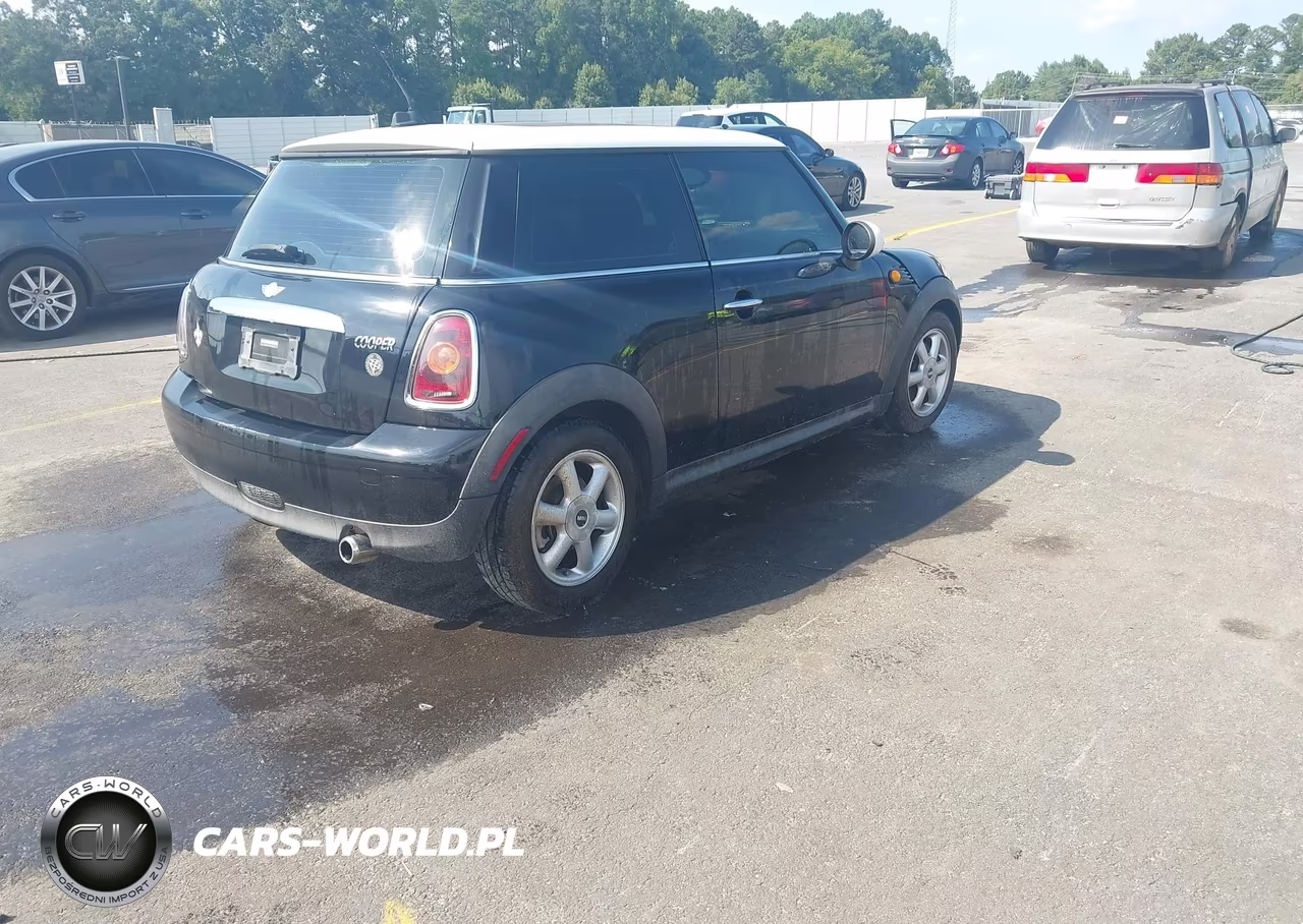 2009 Mini Cooper VIN:WMWMF33509TW76398 - 4