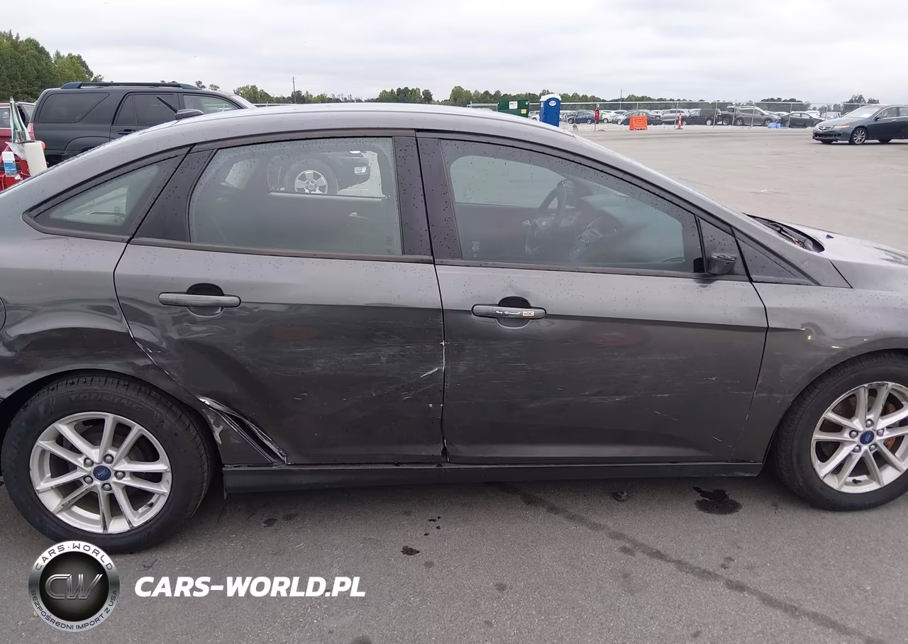 2016 Ford Focus Se VIN:1FADP3F28GL319555 - 12