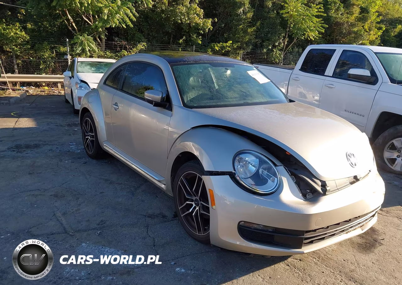 2014 Volkswagen Beetle 2.5L VIN:3VWJP7AT8EM612904 - 1