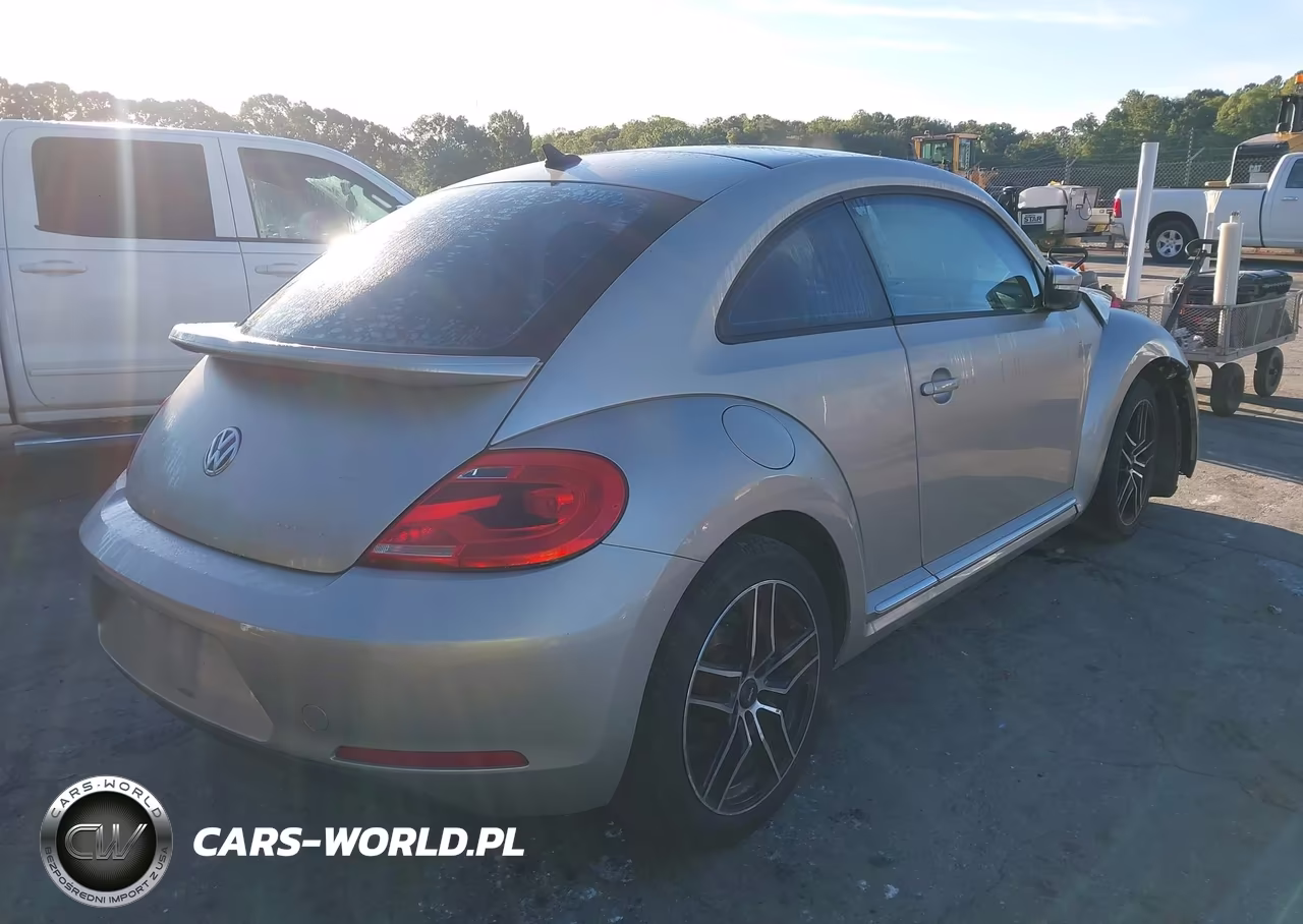 2014 Volkswagen Beetle 2.5L VIN:3VWJP7AT8EM612904 - 4