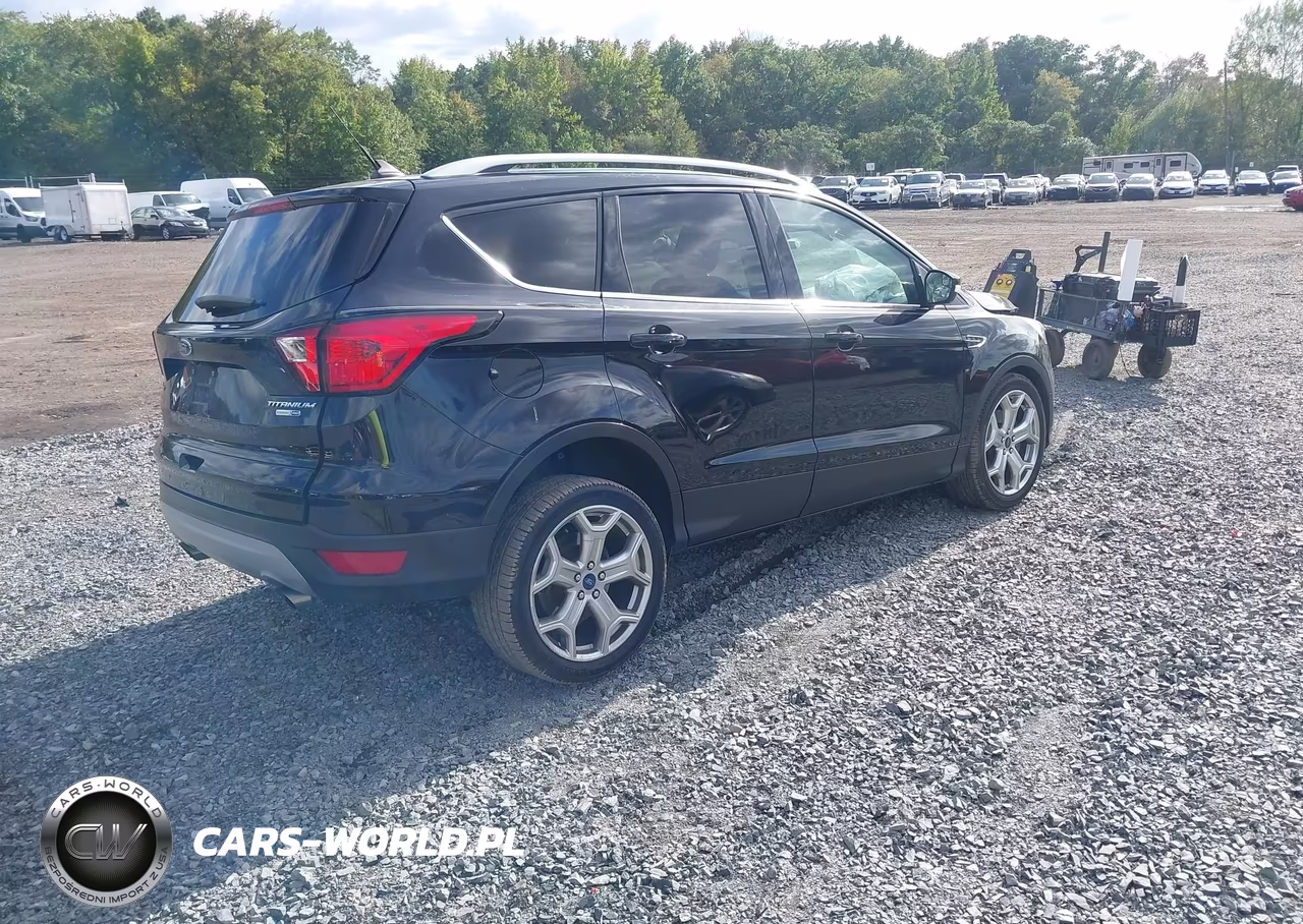2019 Ford Escape Titanium VIN:1FMCU9J93KUA22231 - 4