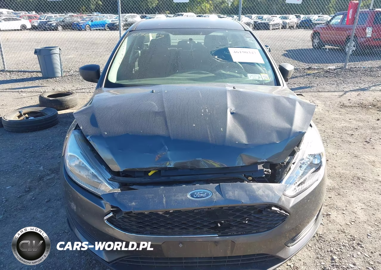 2018 Ford Focus S VIN:1FADP3E25JL318565 - 12