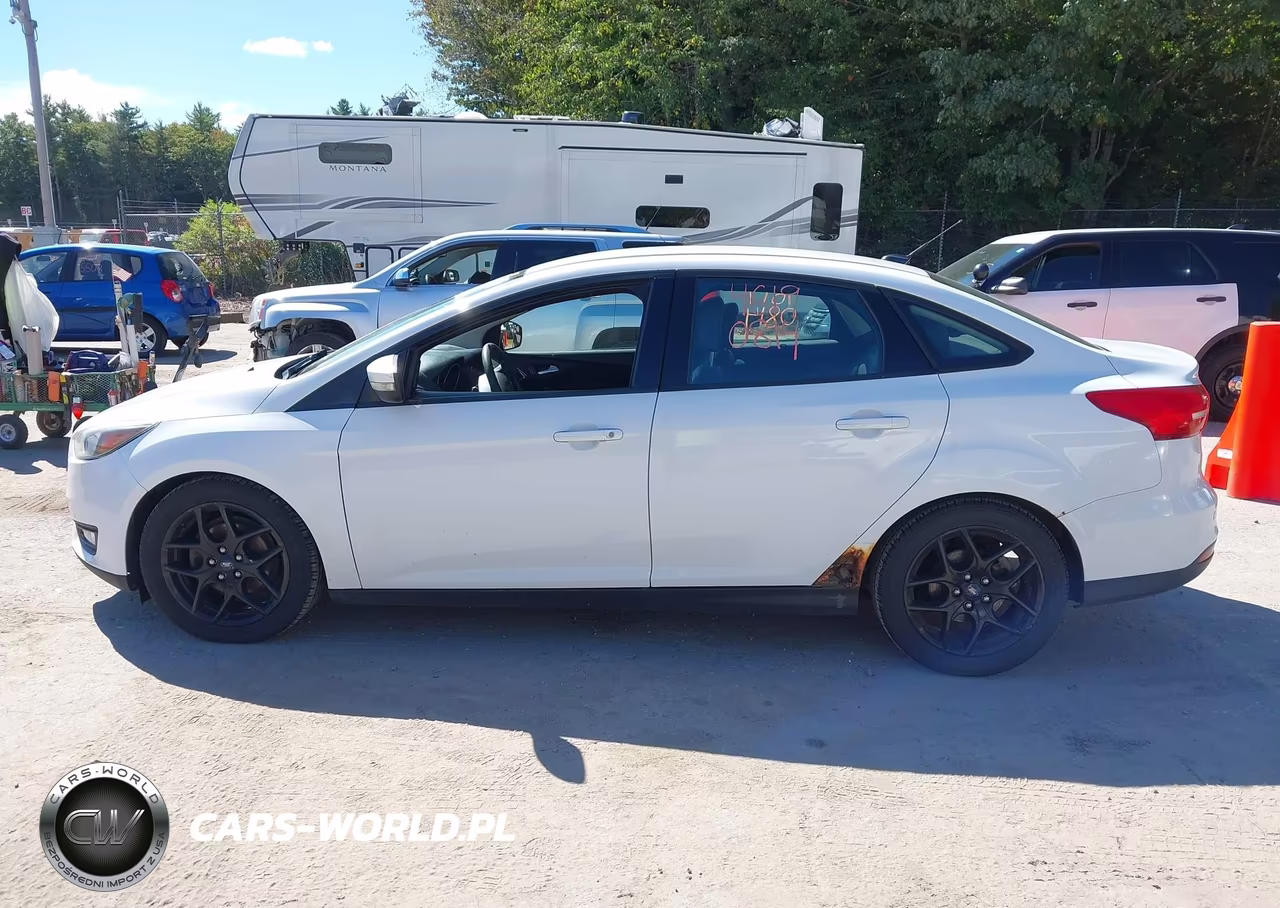 2016 Ford Focus Se VIN:1FADP3F29GL330189 - 12
