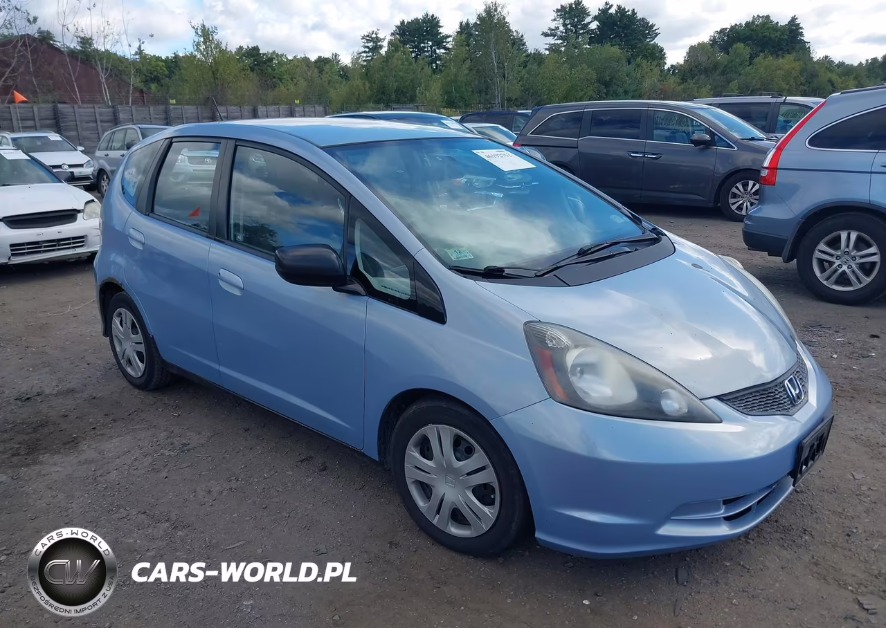 2009 Honda Fit VIN:JHMGE87249S070574 - 1