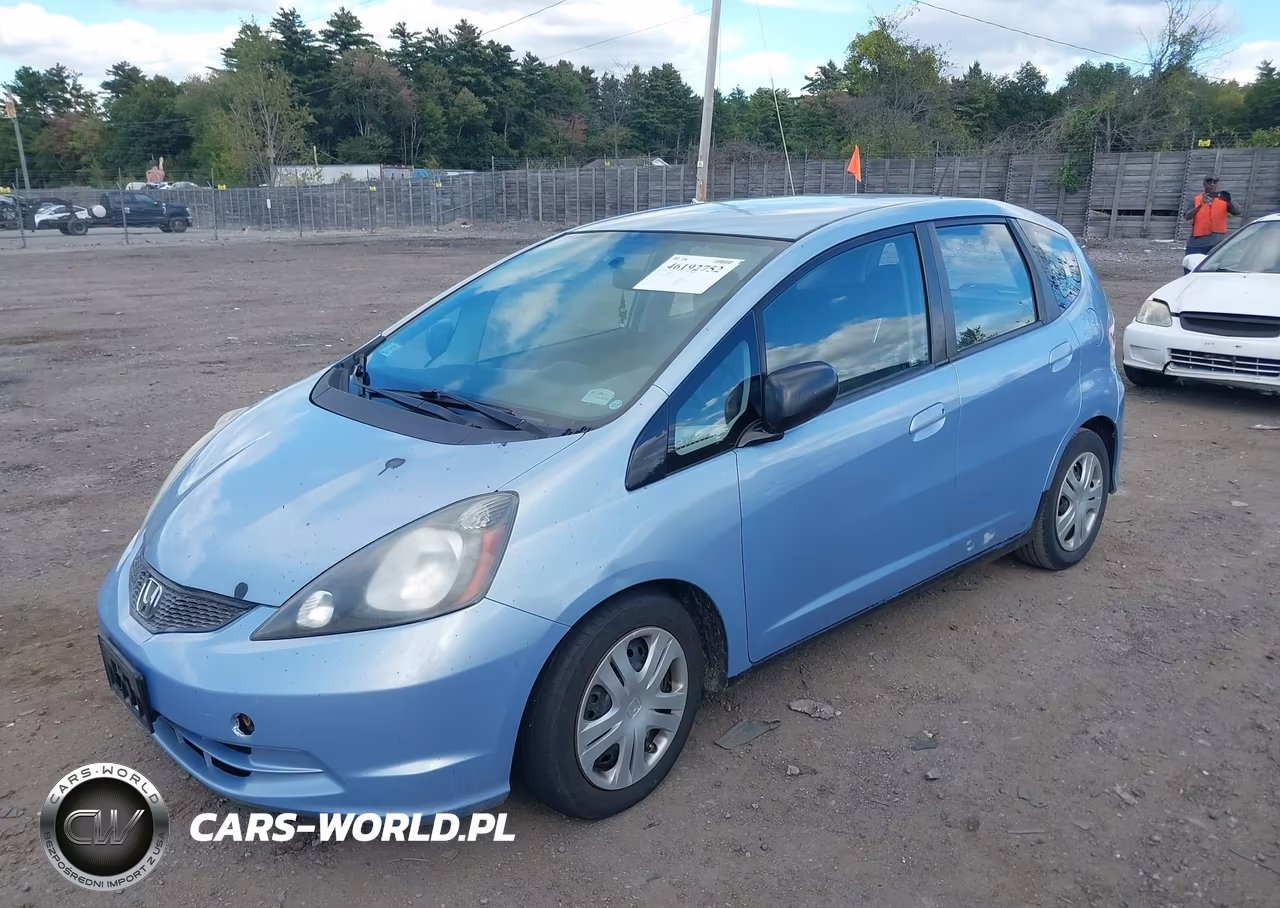 2009 Honda Fit VIN:JHMGE87249S070574 - 2
