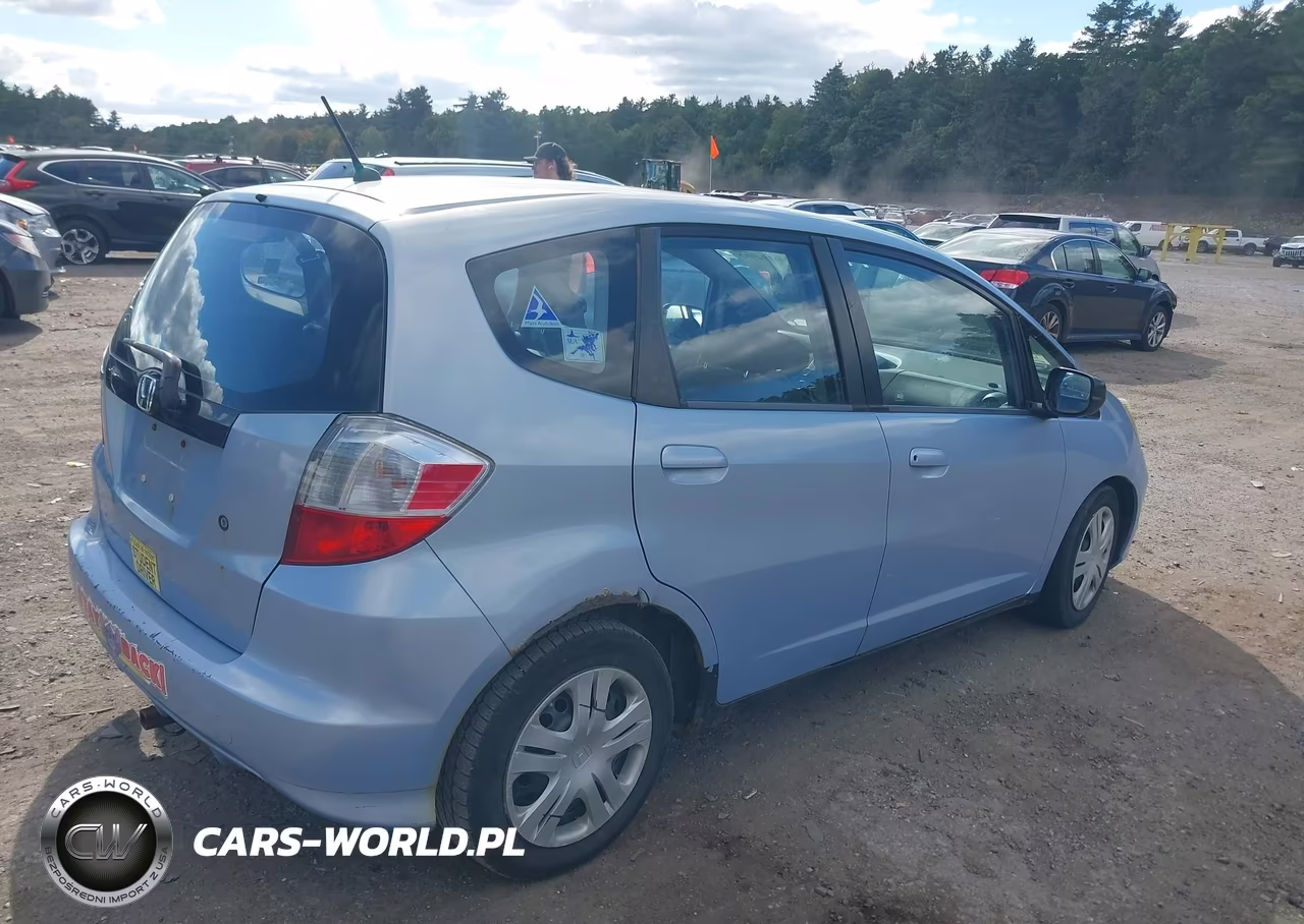 2009 Honda Fit VIN:JHMGE87249S070574 - 4