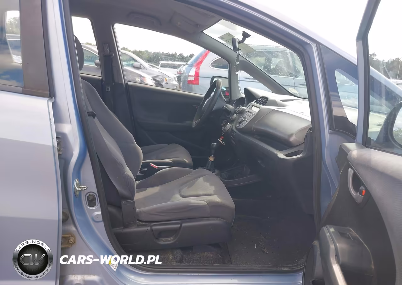 2009 Honda Fit VIN:JHMGE87249S070574 - 5