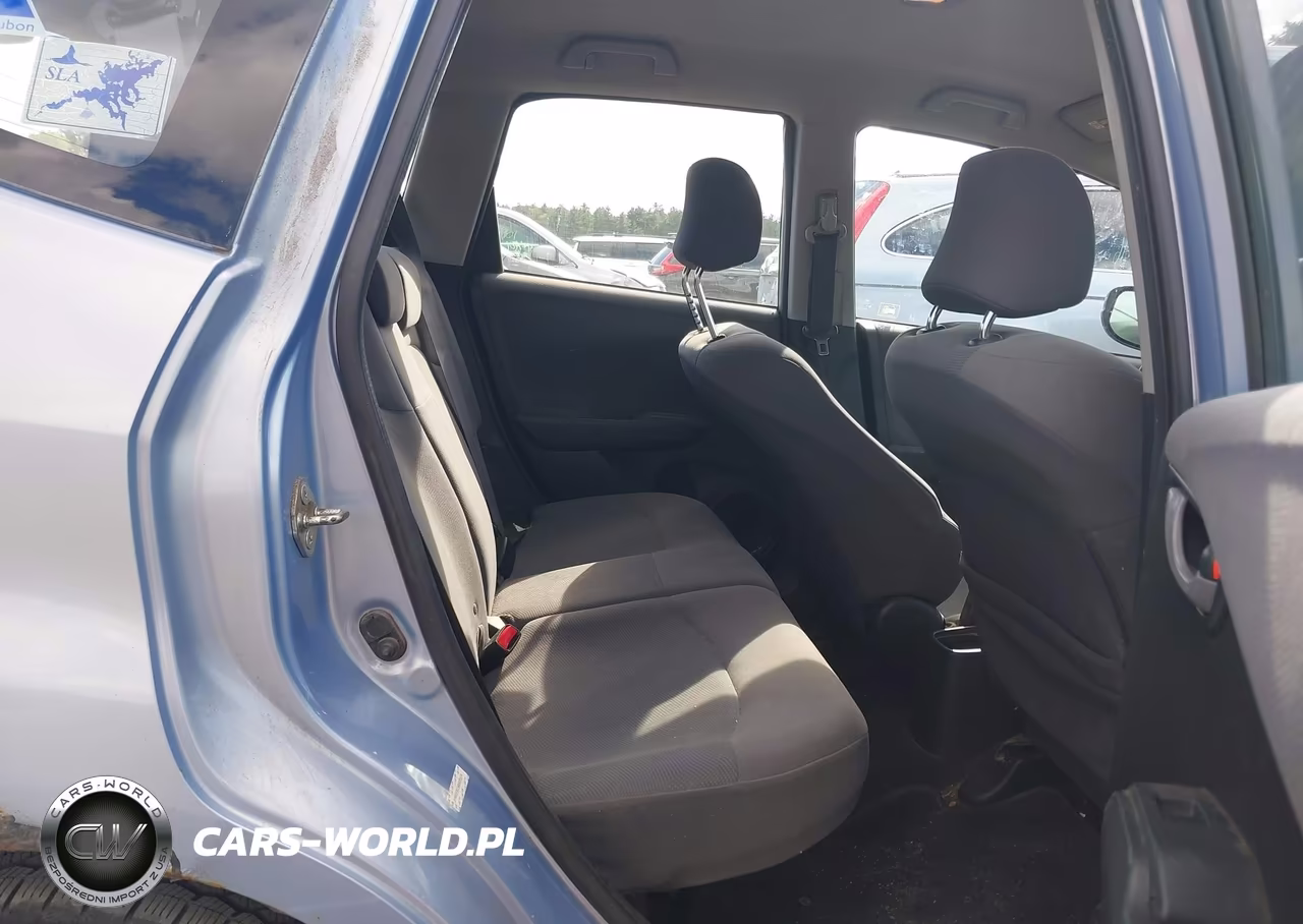 2009 Honda Fit VIN:JHMGE87249S070574 - 8