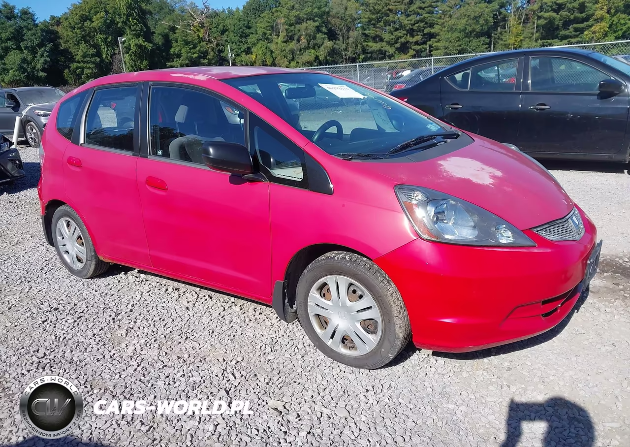 2009 Honda Fit VIN:JHMGE87259S009427 - 1