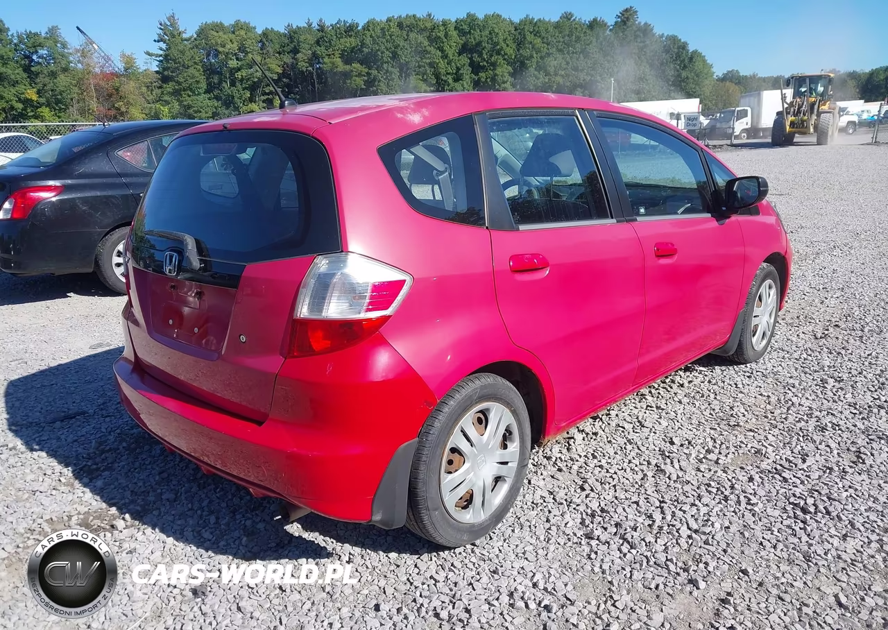 2009 Honda Fit VIN:JHMGE87259S009427 - 4