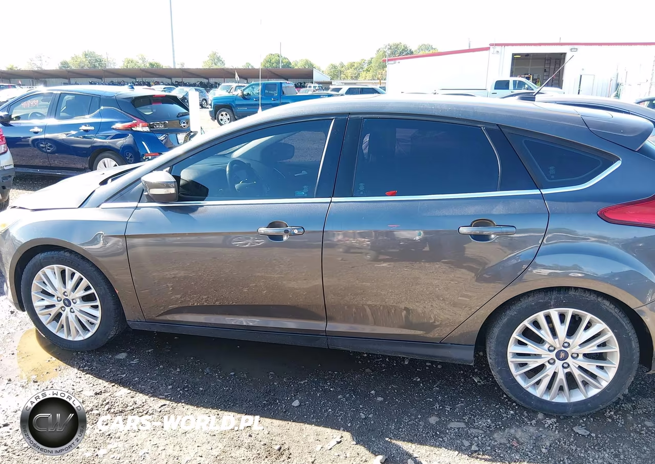 2017 Ford Focus Titanium VIN:1FADP3N2XHL201008 - 14