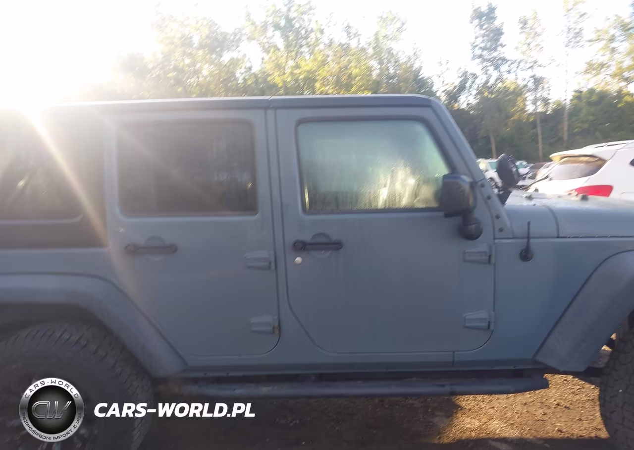 2015 Jeep Wrangler Unlimited Sport VIN:1C4BJWDGXFL734412 - 13
