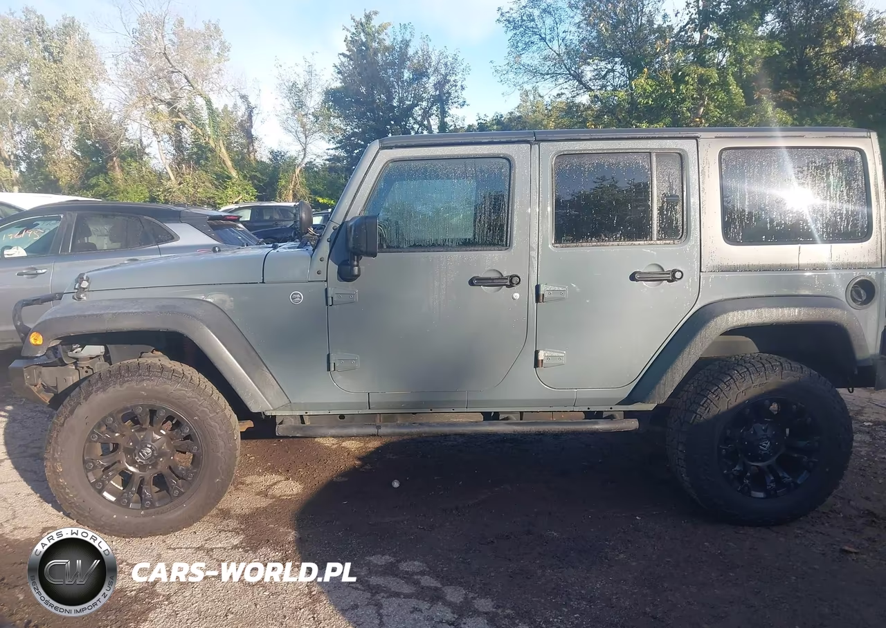 2015 Jeep Wrangler Unlimited Sport VIN:1C4BJWDGXFL734412 - 14