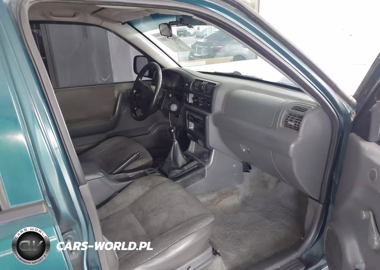 1999 Isuzu Rodeo S 2.2L VIN:4S2CK58D7X4364659 - 5