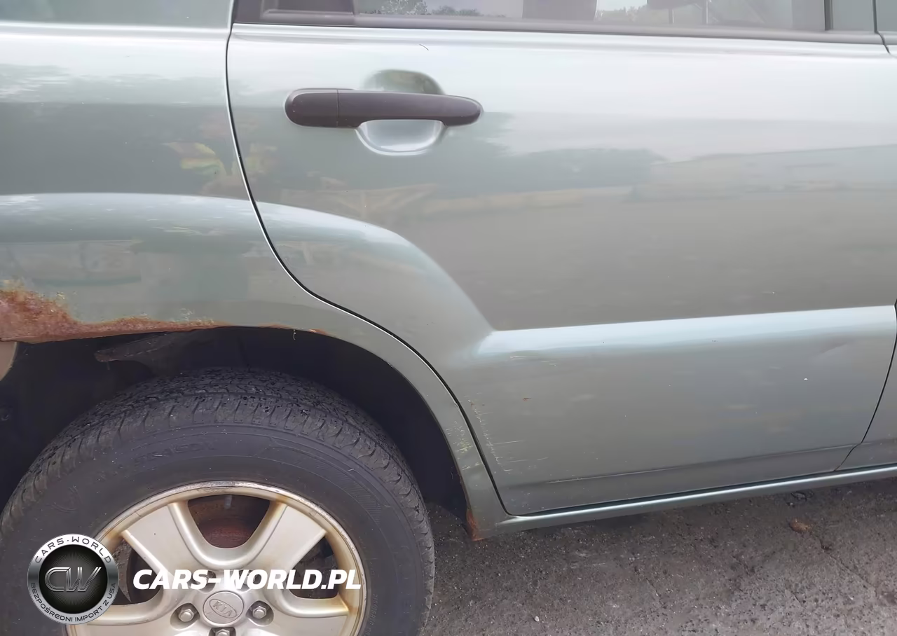 2007 Kia Sportage Lx VIN:KNDJE724X77451050 - 12