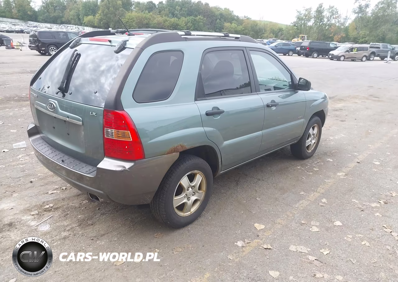 2007 Kia Sportage Lx VIN:KNDJE724X77451050 - 4