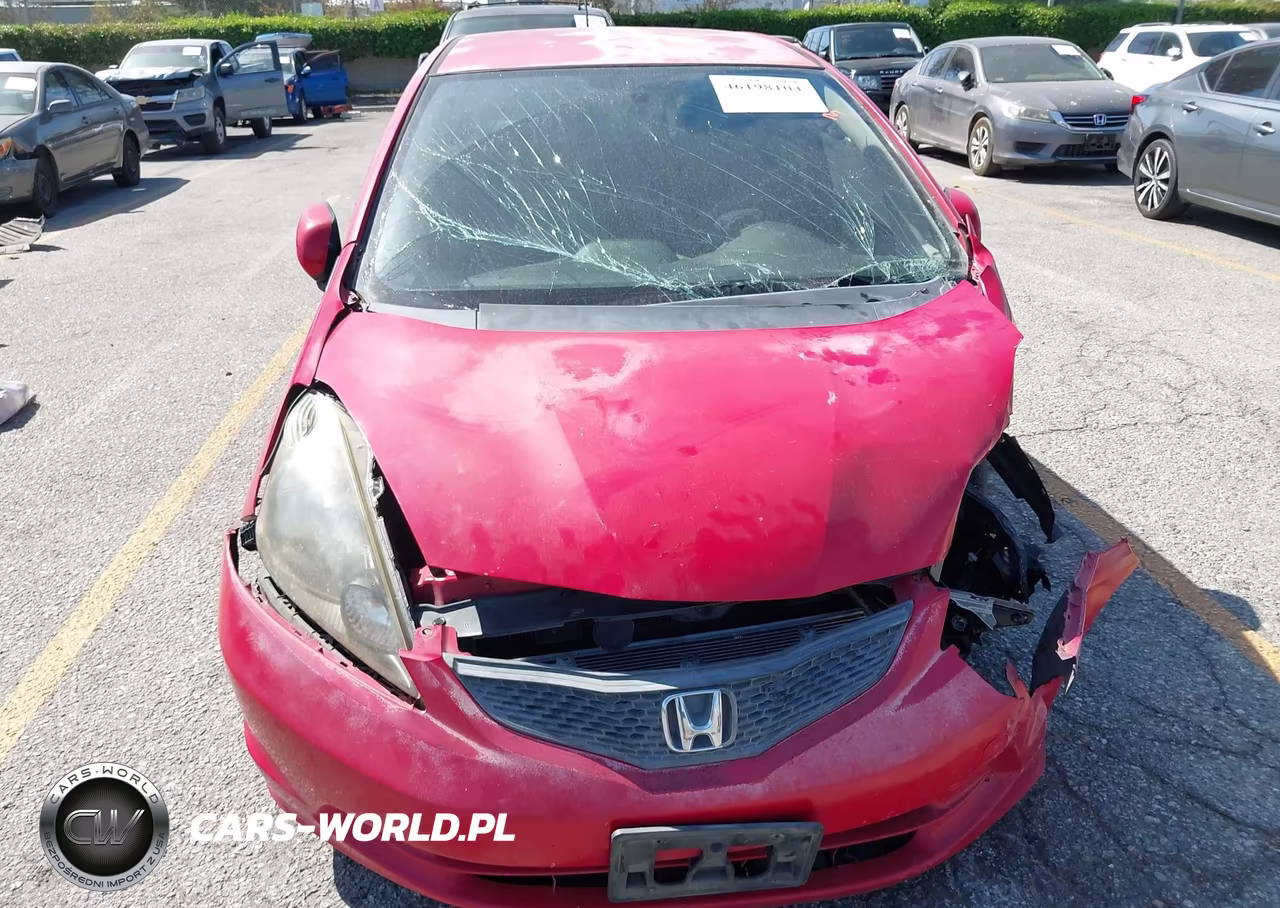2012 Honda Fit VIN:JHMGE8H30CC040612 - 12
