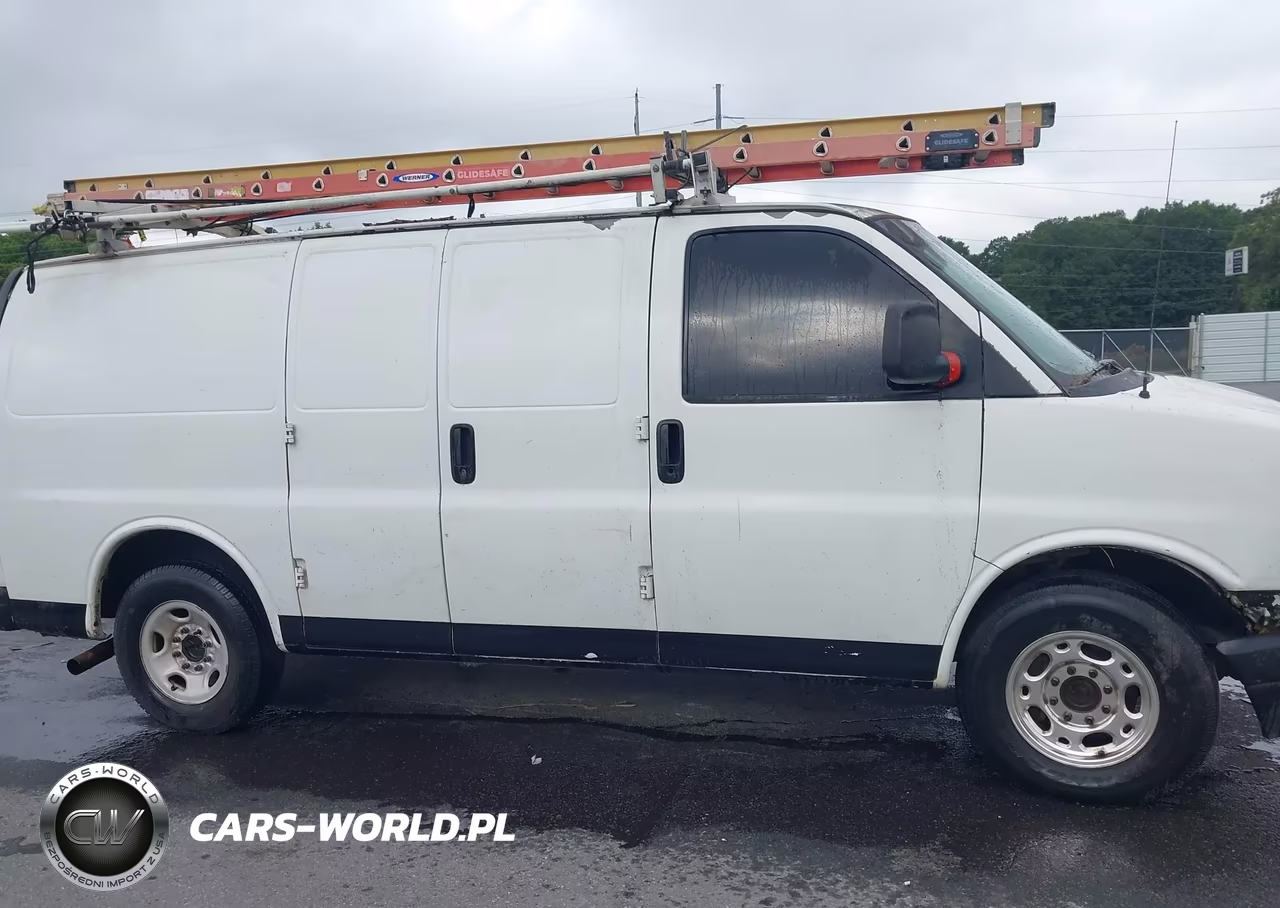2013 Chevrolet Express Work Van VIN:1GCWGFBA6D1115426 - 13