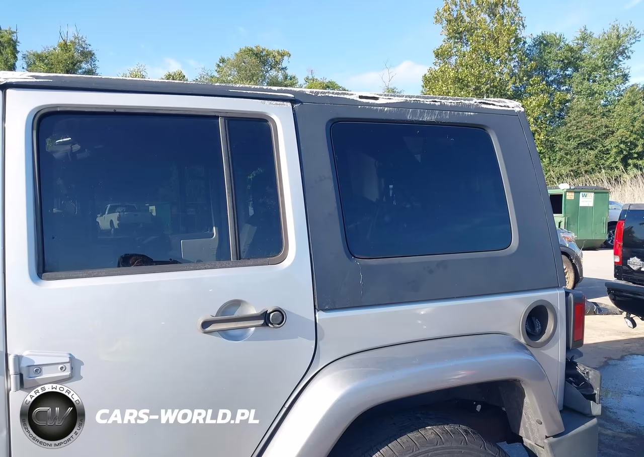 2009 Jeep Wrangler Unlimited Sahara VIN:1J4GA59169L726908 - 13