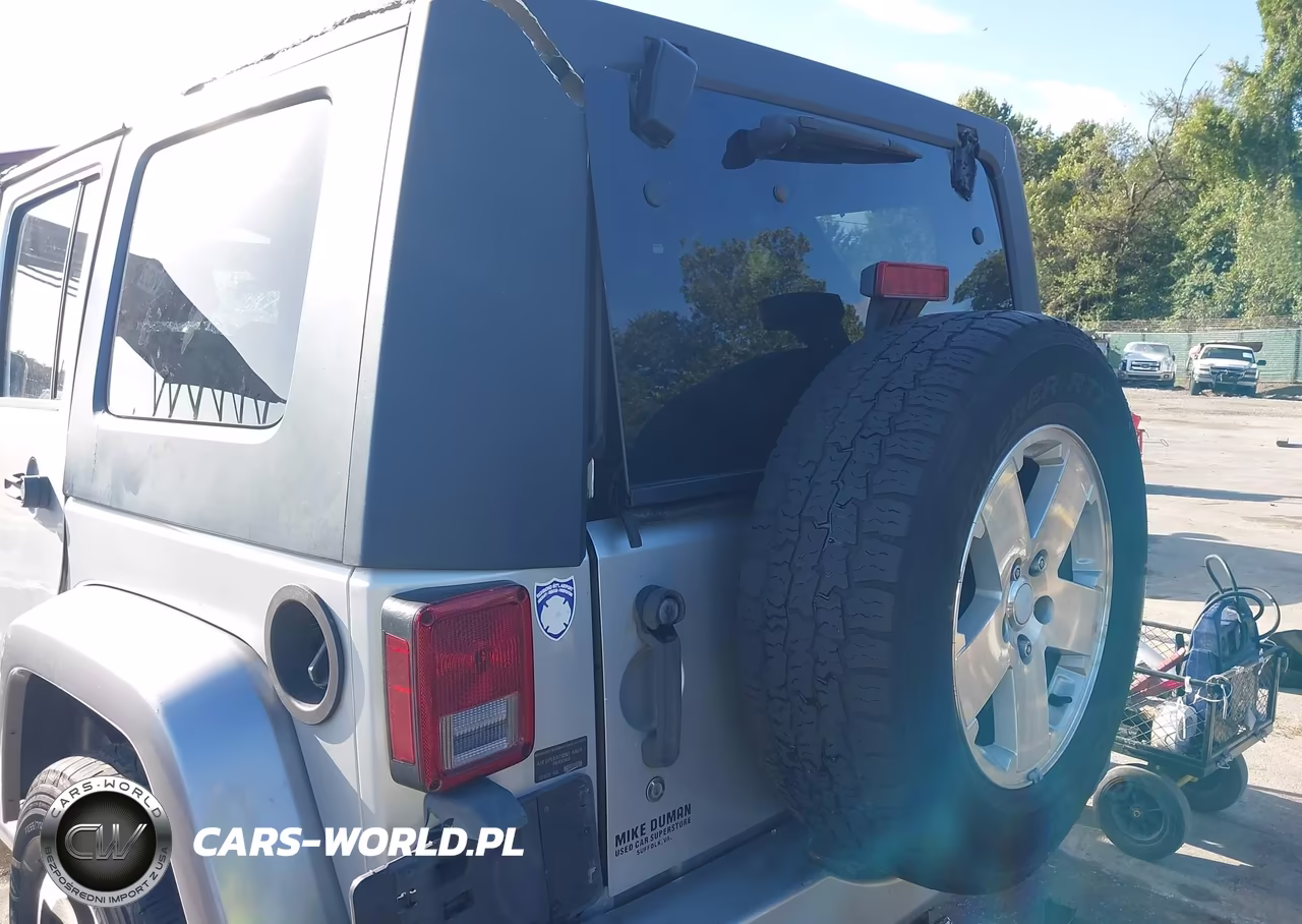 2009 Jeep Wrangler Unlimited Sahara VIN:1J4GA59169L726908 - 15