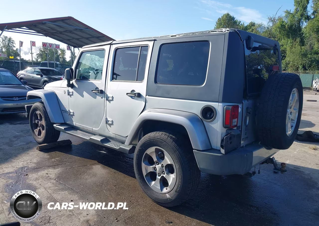 2009 Jeep Wrangler Unlimited Sahara VIN:1J4GA59169L726908 - 3