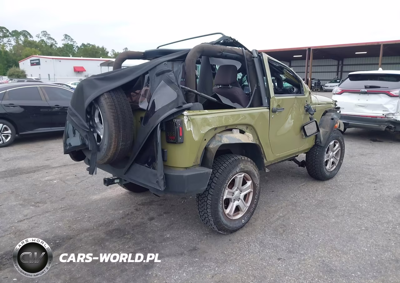 2013 Jeep Wrangler Sport VIN:1C4AJWAG1DL649584 - 4