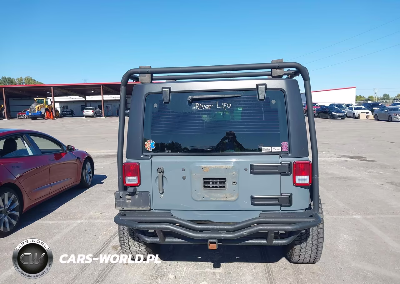 2015 Jeep Wrangler Unlimited Sport VIN:1C4BJWDG2FL598180 - 17