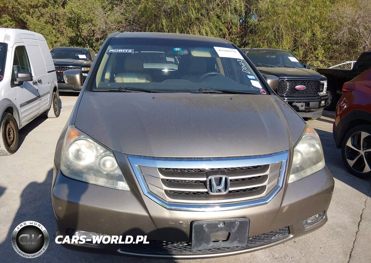 2010 Honda Odyssey Touring VIN:5FNRL3H93AB055709 - 12