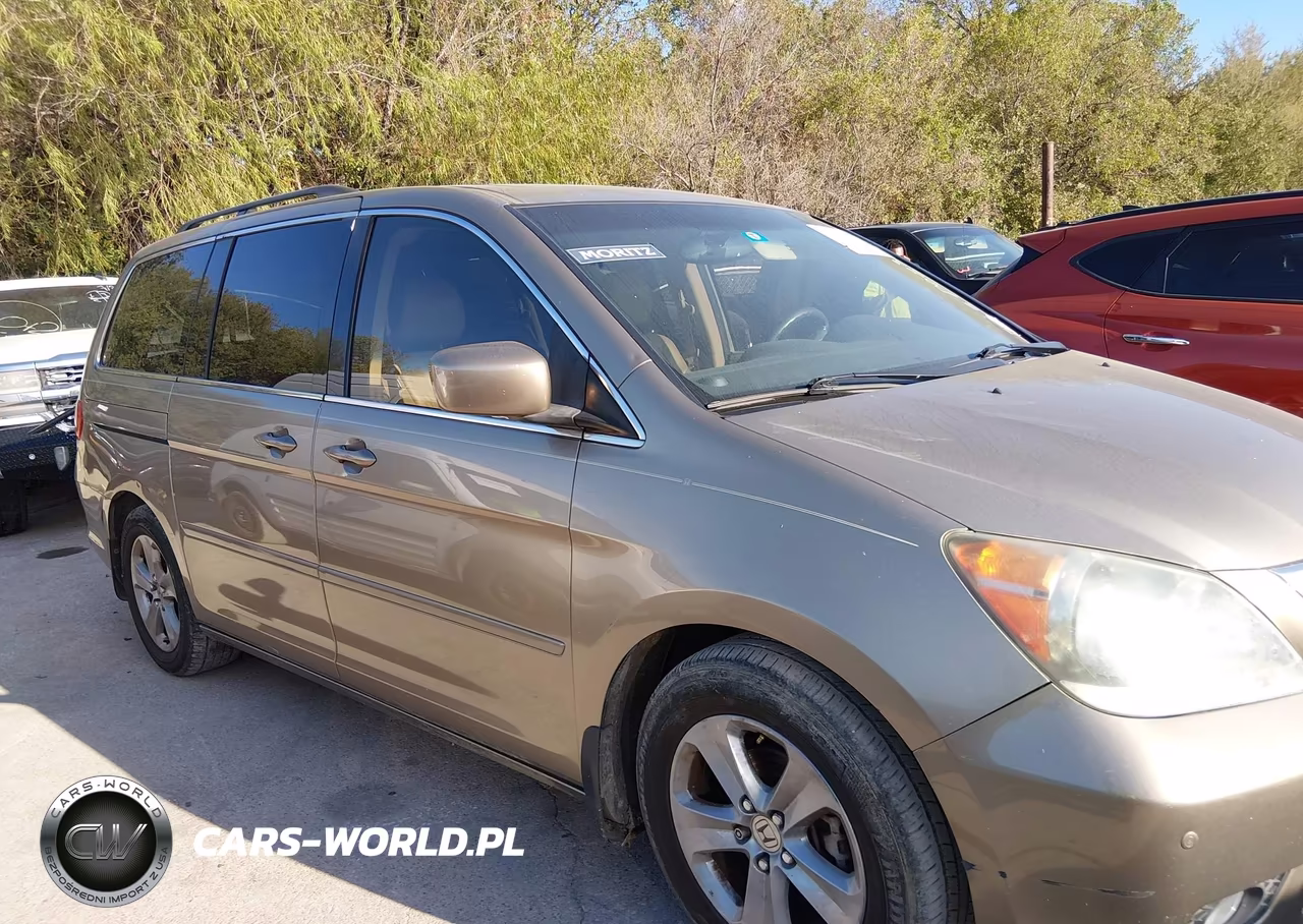 2010 Honda Odyssey Touring VIN:5FNRL3H93AB055709 - 13