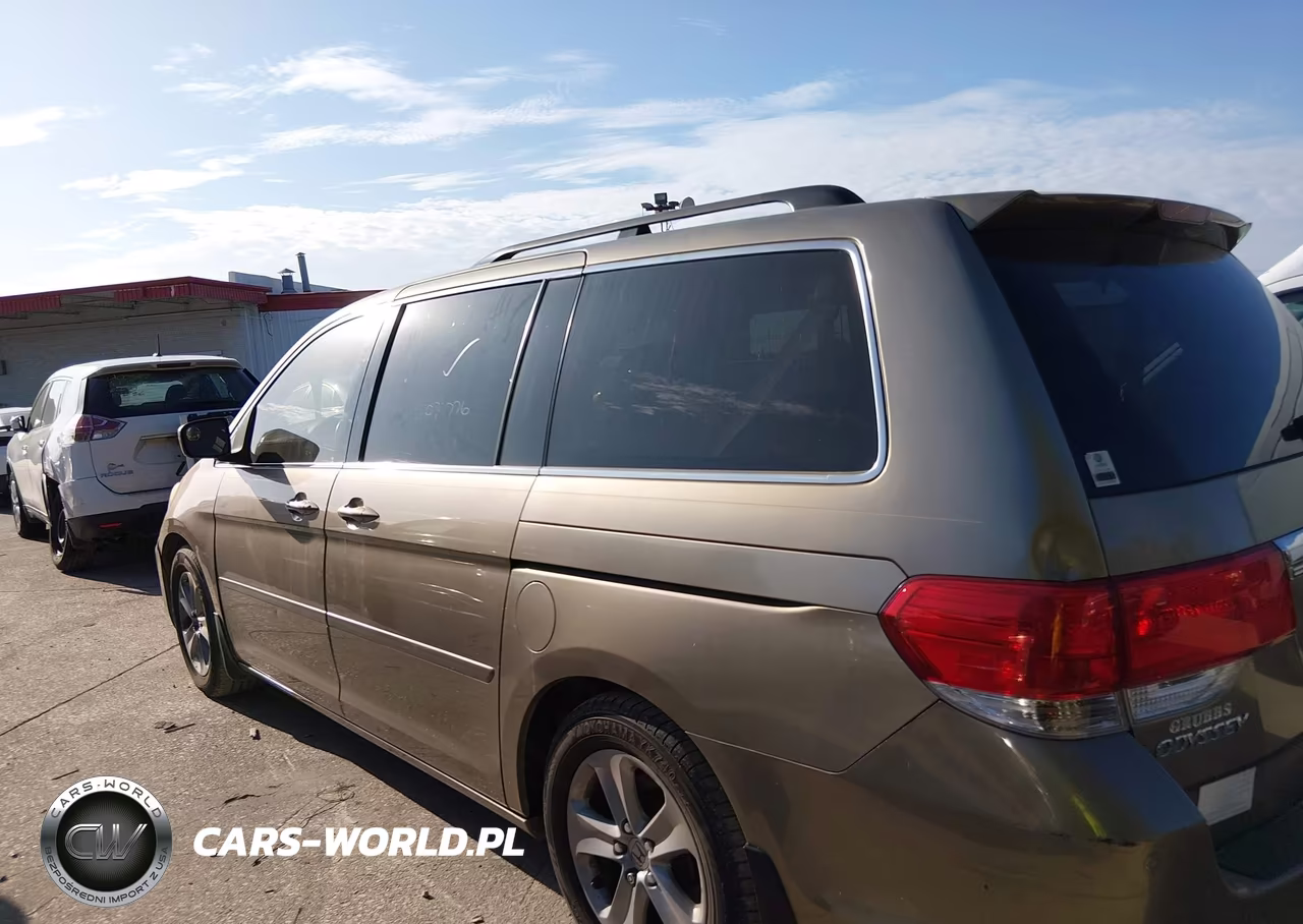 2010 Honda Odyssey Touring VIN:5FNRL3H93AB055709 - 14