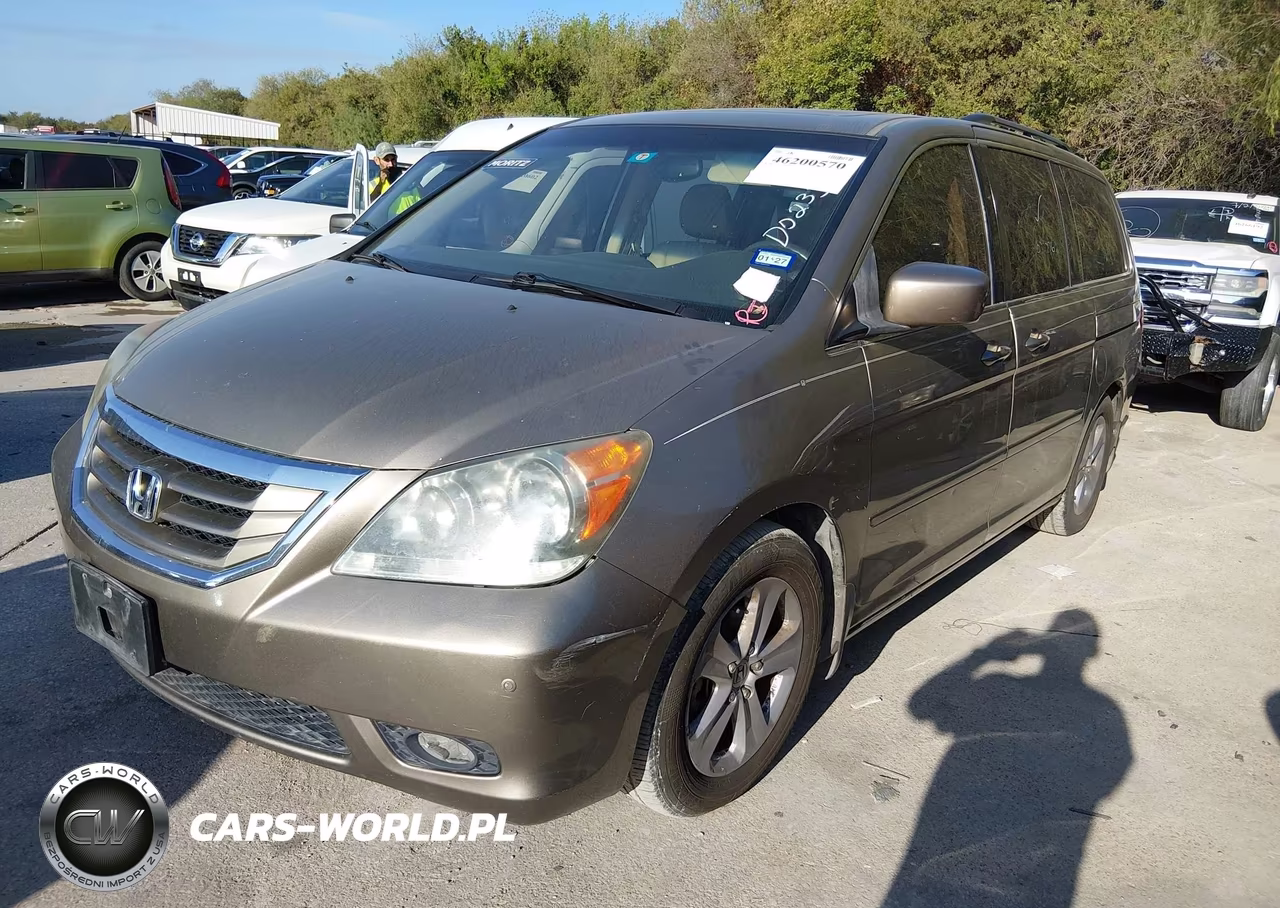 2010 Honda Odyssey Touring VIN:5FNRL3H93AB055709 - 2