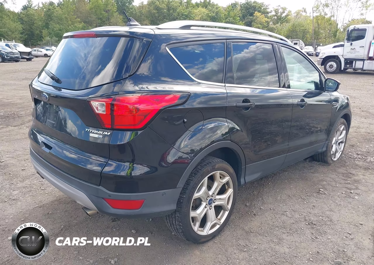 2019 Ford Escape Titanium VIN:1FMCU9J96KUB42007 - 4